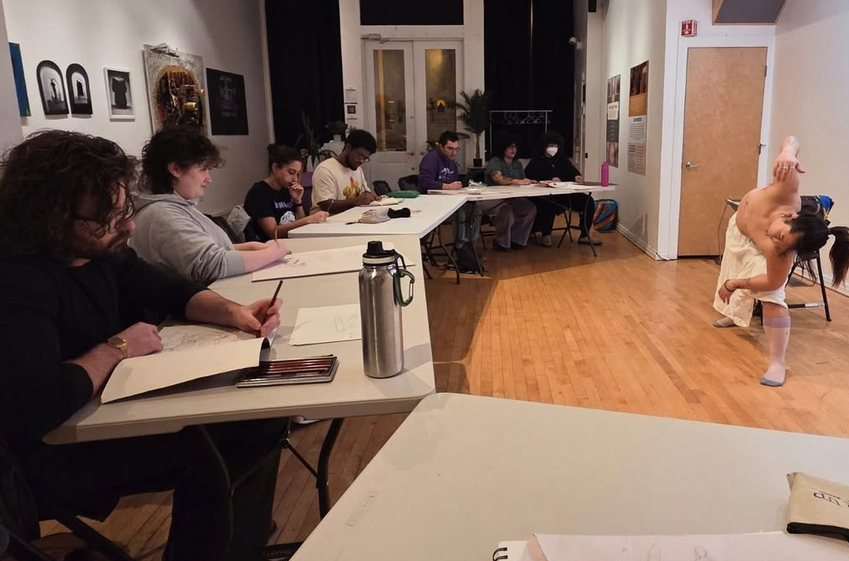 photo of freaks drawing another freak